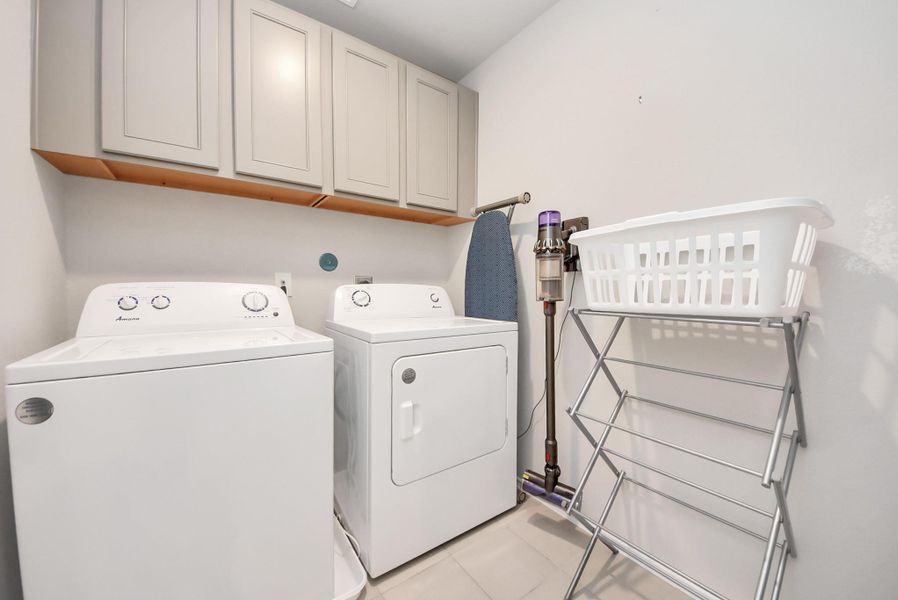 The utility room is located upstairs near all 3 bedrooms. Easy access for everyone. Lots of cabinet space and hard surface flooring. Nice and roomy! The utility room is located upstairs near all 3 bedrooms. Easy access for everyone. Lots of cabinet space and hard surface flooring. Nice and roomy!