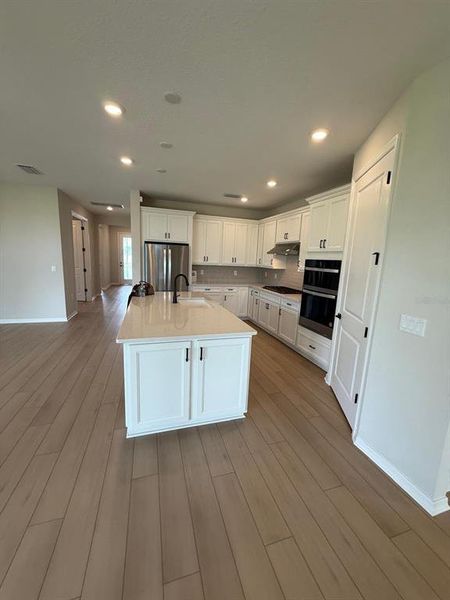 Furnished interior view inside a new home in , St. Cloud (Image 12).
