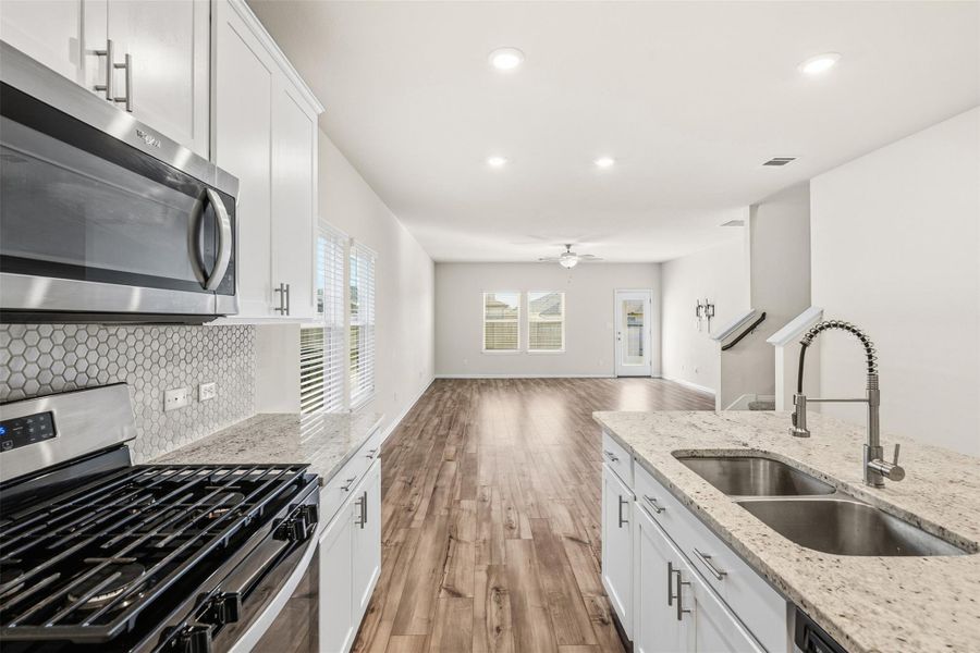 Furnished interior view inside a new home in Butler Farms - Reserve Collection, Liberty Hill (Image 14).