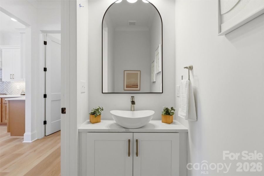 half bath w/ thoughtfully selected vanity