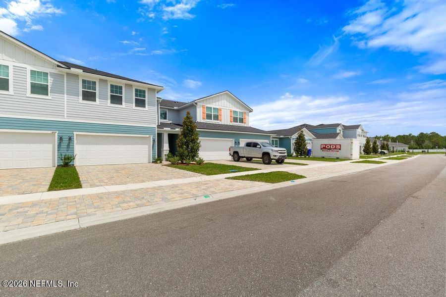 Front exterior of a new home in , St. Augustine, FL, highlighting curb appeal (Image 28).