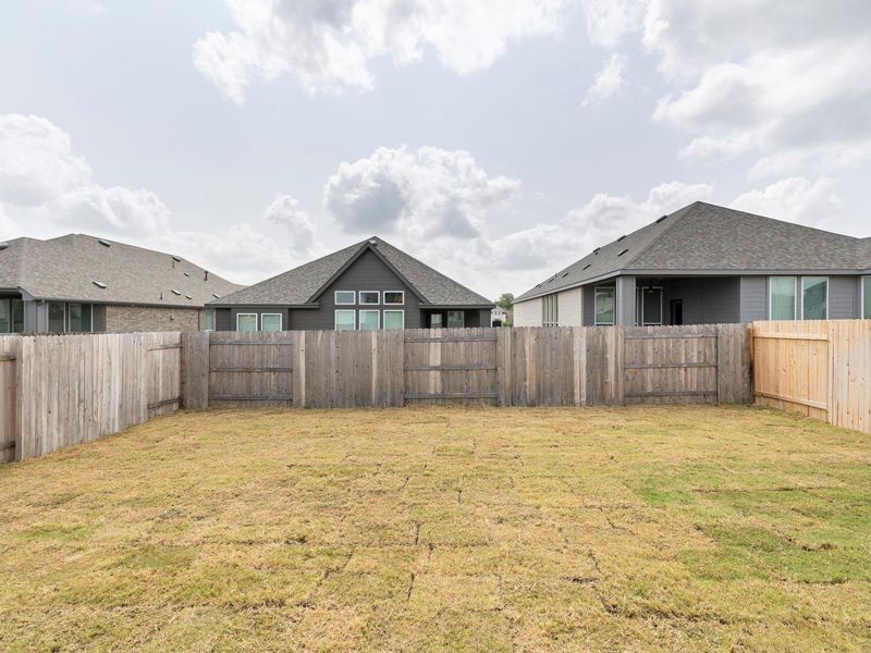 Exterior details and patio area of a home in Crosswinds, Kyle (Image 14).