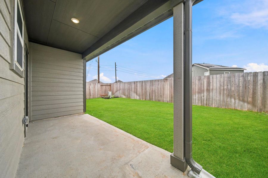 Exterior details and patio area of a home in Mason Woods, Cypress (Image 20). Exterior details and patio area of a home in Mason Woods, Cypress (Image 20).
