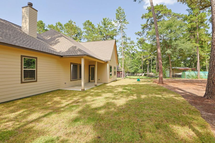 Exterior details and patio area of a home in , Magnolia (Image 26).