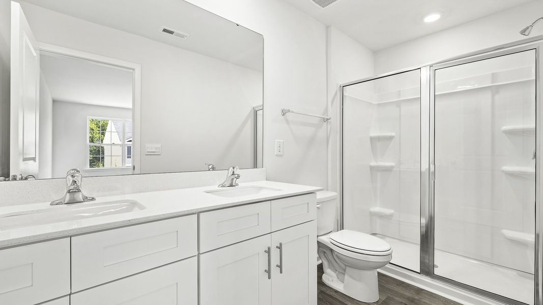 Furnished interior view inside a new home in North Village Townes, Greensboro (Image 5).