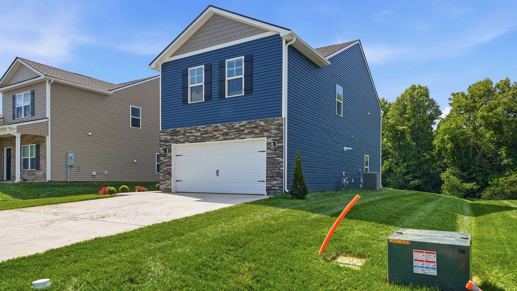 Front exterior of a new home in Fieldcrest Acres, Blountville, TN, highlighting curb appeal (Image 2). Front exterior of a new home in Fieldcrest Acres, Blountville, TN, highlighting curb appeal (Image 2).
