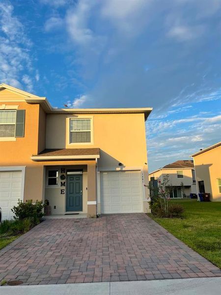 Front exterior of a new home in , Kissimmee, FL, highlighting curb appeal (Image 1). Front exterior of a new home in , Kissimmee, FL, highlighting curb appeal (Image 1).