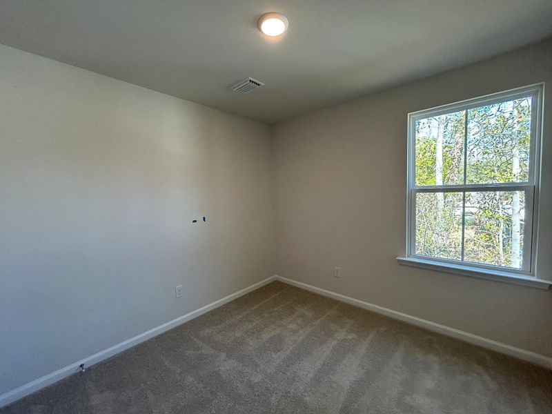 Spacious, unfurnished interior of a new home in Windward Village, Summerville (Image 13).