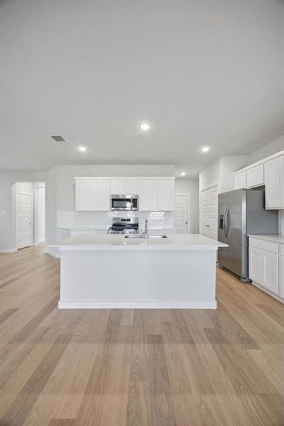 Kitchen in the Oak II home plan by Trophy Signature Homes – REPRESENTATIVE PHOTO