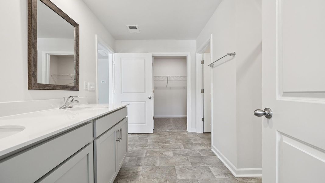 Furnished interior view inside a new home in Lakestone, Woodruff (Image 13).