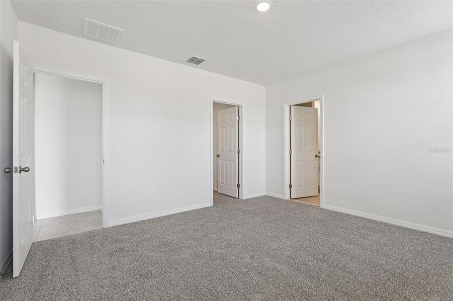 Spacious, unfurnished interior of a new home in Lawson Dunes - Signature Series, Haines City (Image 28).