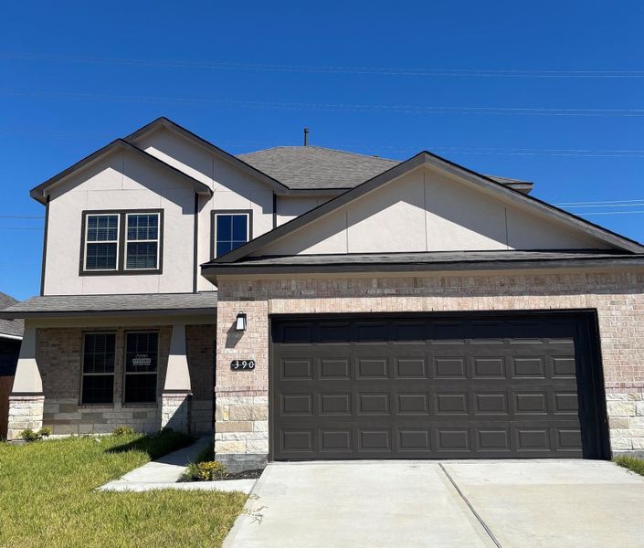 Front exterior of a new home in Kendall Lakes, Alvin, TX, highlighting curb appeal (Image 21). Front exterior of a new home in Kendall Lakes, Alvin, TX, highlighting curb appeal (Image 21).