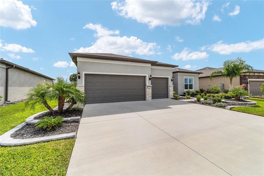 Front exterior of a new home in , Ocala, FL, highlighting curb appeal (Image 24).