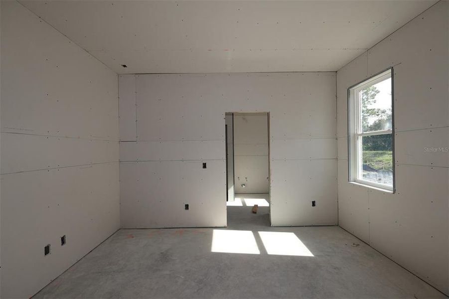 In-progress construction of a new home in Eden at Crossprairie, St. Cloud, FL (Image 12).