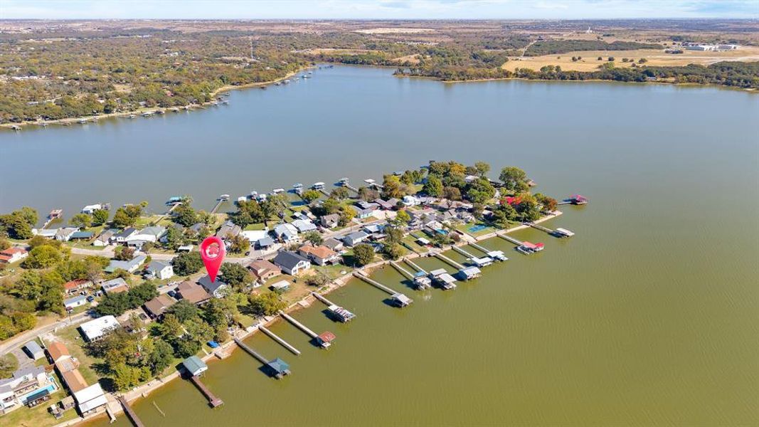 View of property location with a large body of water