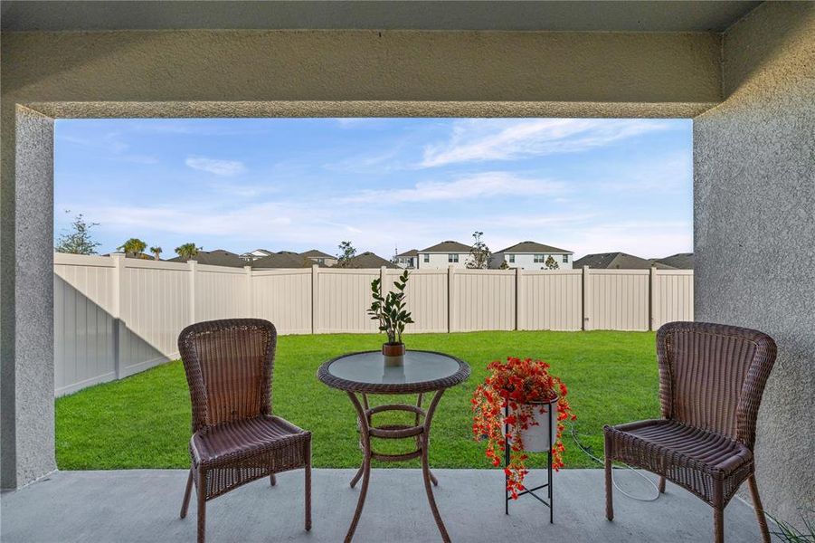 Exterior details and patio area of a home in Silverstone North, Palmetto (Image 24).