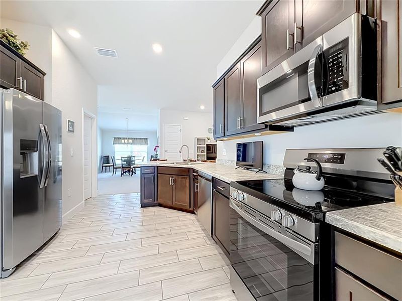 Furnished interior view inside a new home in , Spring Hill (Image 31).