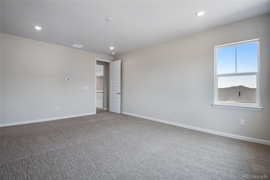 Spacious, unfurnished interior of a new home in Ensemble at The Aurora Highlands, Aurora (Image 38).