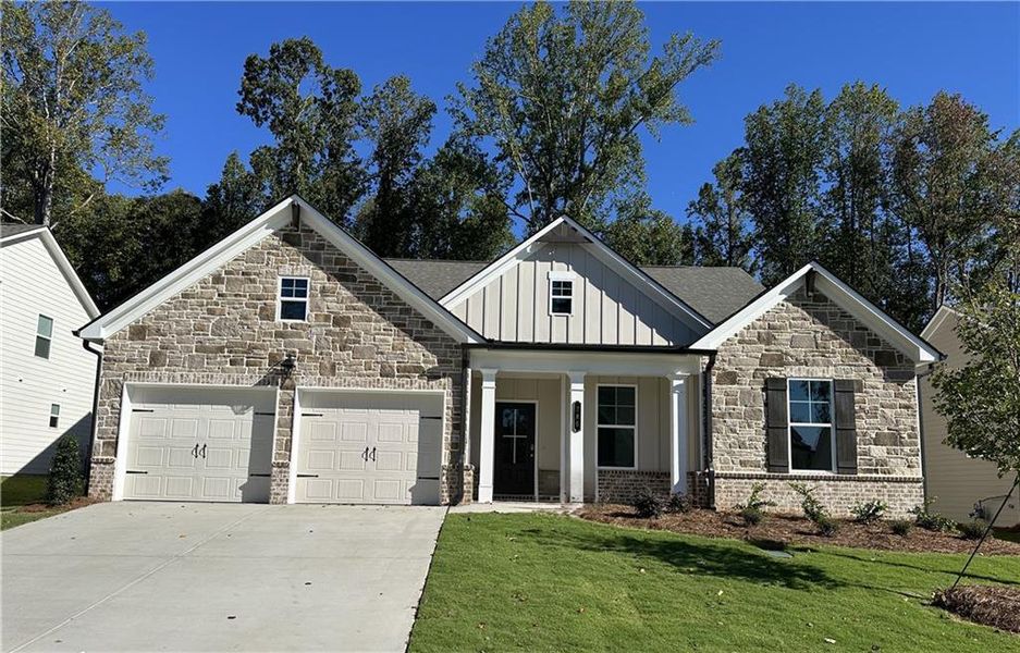 Front exterior of a new home in Rosewood Lake Preserve, Hoschton, GA, highlighting curb appeal (Image 6). Front exterior of a new home in Rosewood Lake Preserve, Hoschton, GA, highlighting curb appeal (Image 6).