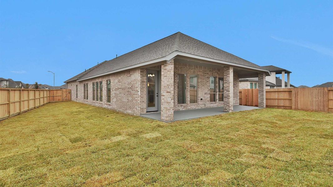 Exterior details and patio area of a home in Marvida, Cypress (Image 4).