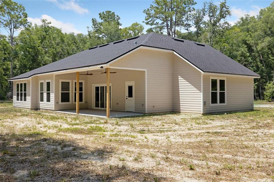 Exterior details and patio area of a home in , Alachua (Image 34).