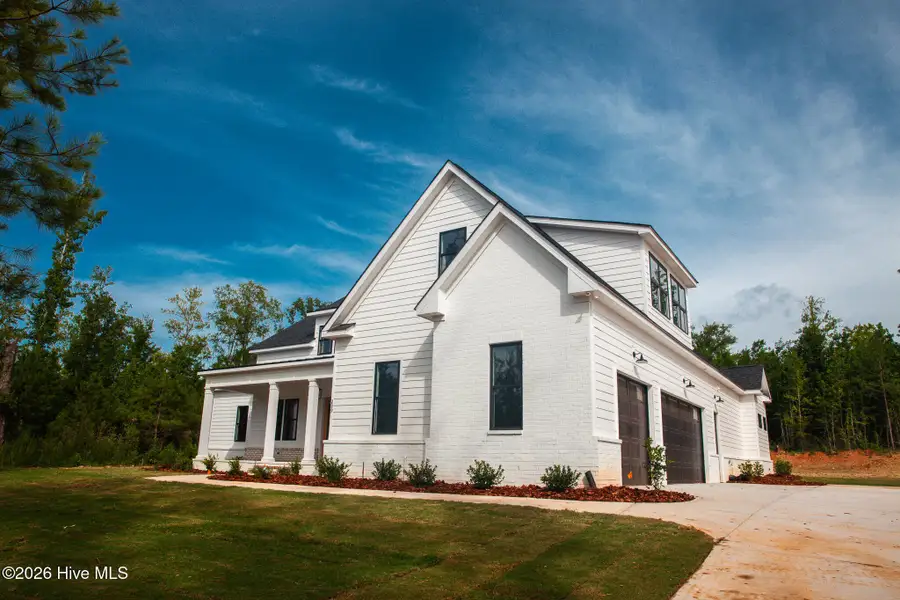 Front exterior of a new home in Marshall Mills, Grovetown, GA, highlighting curb appeal (Image 4). Front exterior of a new home in Marshall Mills, Grovetown, GA, highlighting curb appeal (Image 4).