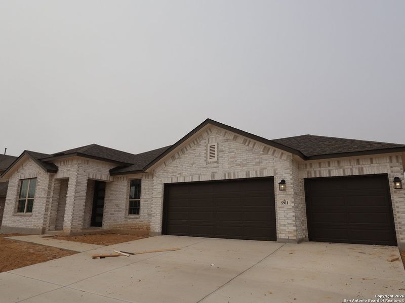 Front exterior of a new home in Preserve at Annabelle Ranch, San Antonio, TX, highlighting curb appeal (Image 13).