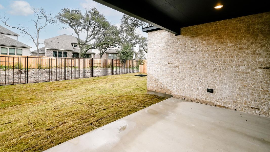 Exterior details and patio area of a home in 6 Creeks, Kyle (Image 4).