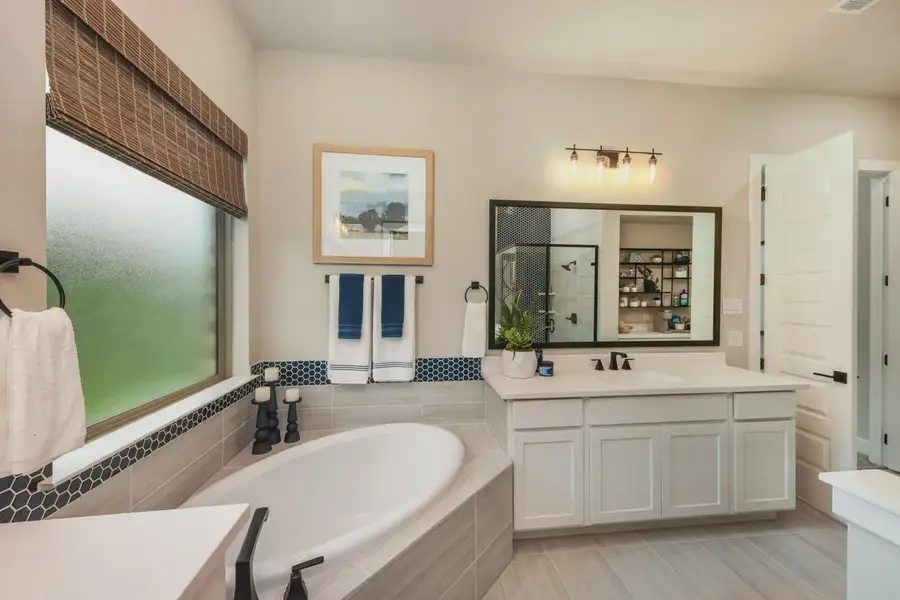 Representative furnished interior of a home built from the Springport by Chesmar Homes in Canyon Falls, Argyle (Image 15).