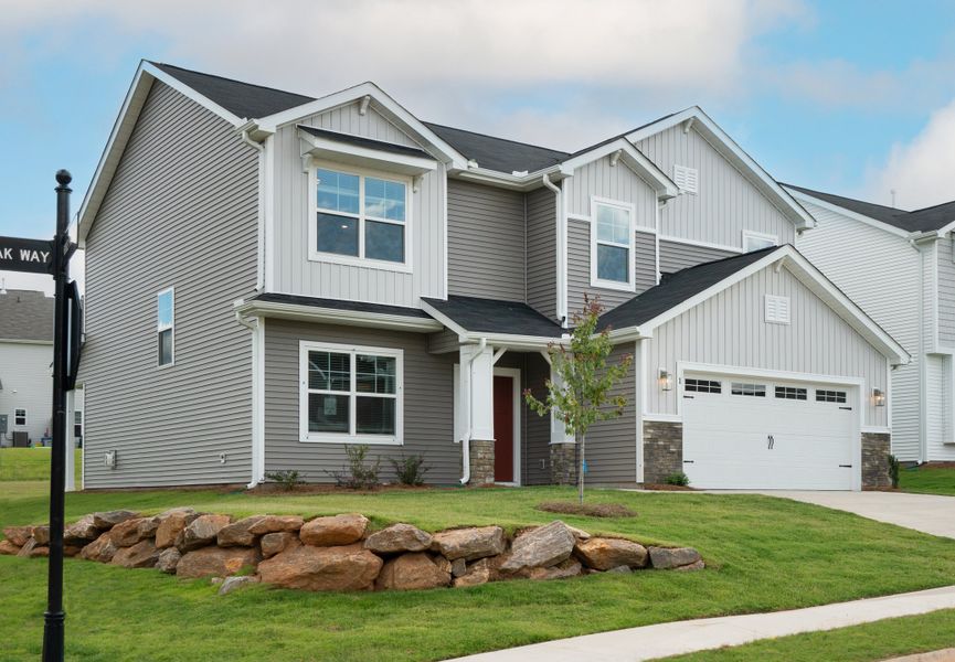 Representative exterior photo of a completed home built from the The McKee by Cothran Homes in Holly Ridge, Greenville, SC (Image 28). Representative exterior photo of a completed home built from the The McKee by Cothran Homes in Holly Ridge, Greenville, SC (Image 28).