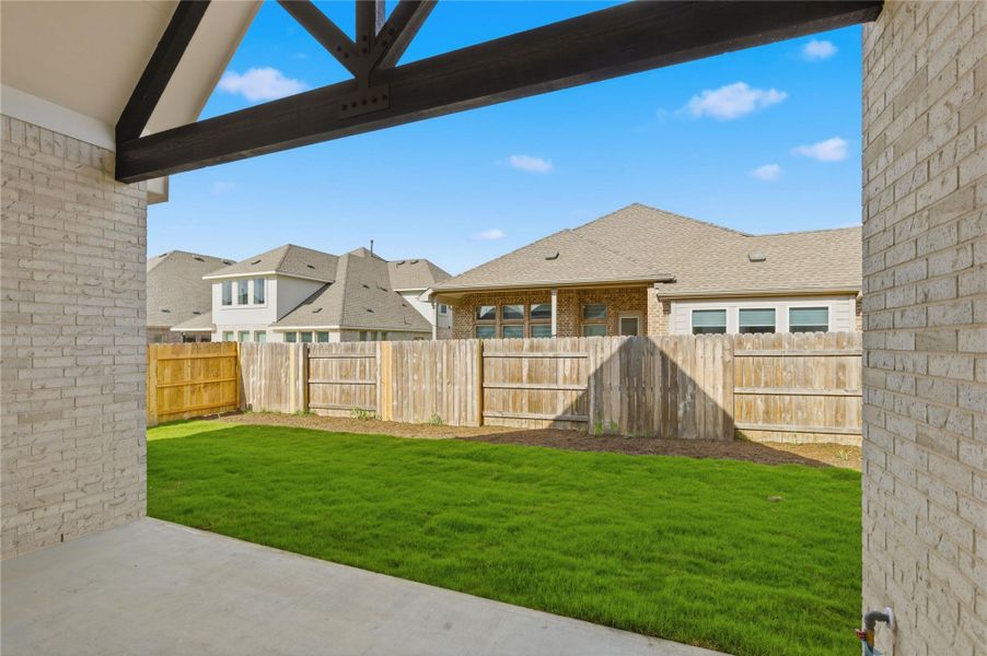 Exterior details and patio area of a home in Hawkes Landing, Leander (Image 2). Exterior details and patio area of a home in Hawkes Landing, Leander (Image 2).