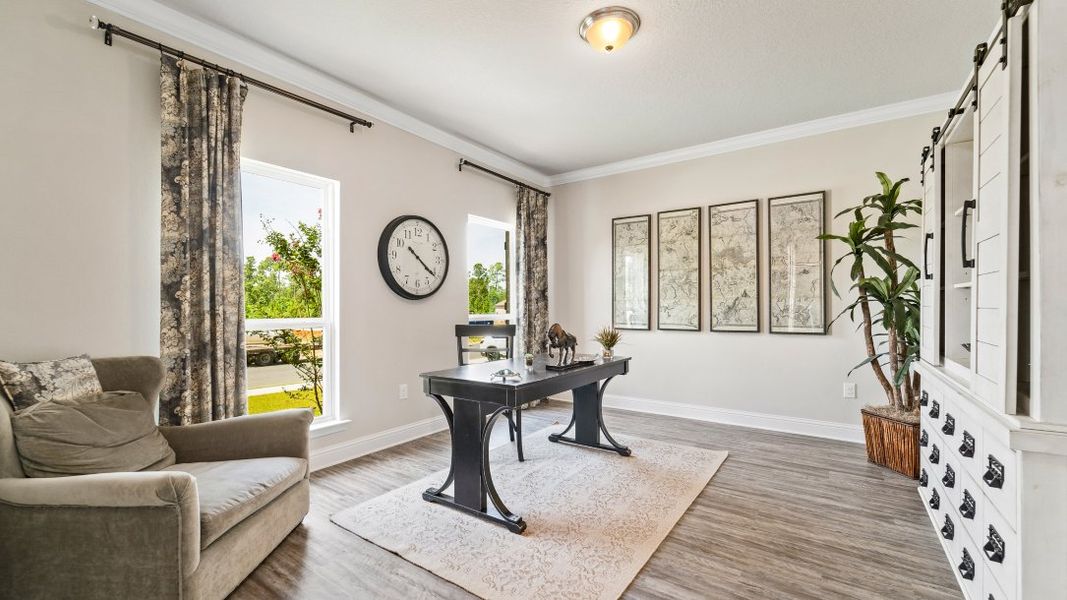 Representative furnished interior of a home built from the The McKenzie by D.R. Horton in Fallschase, Tallahassee (Image 3).