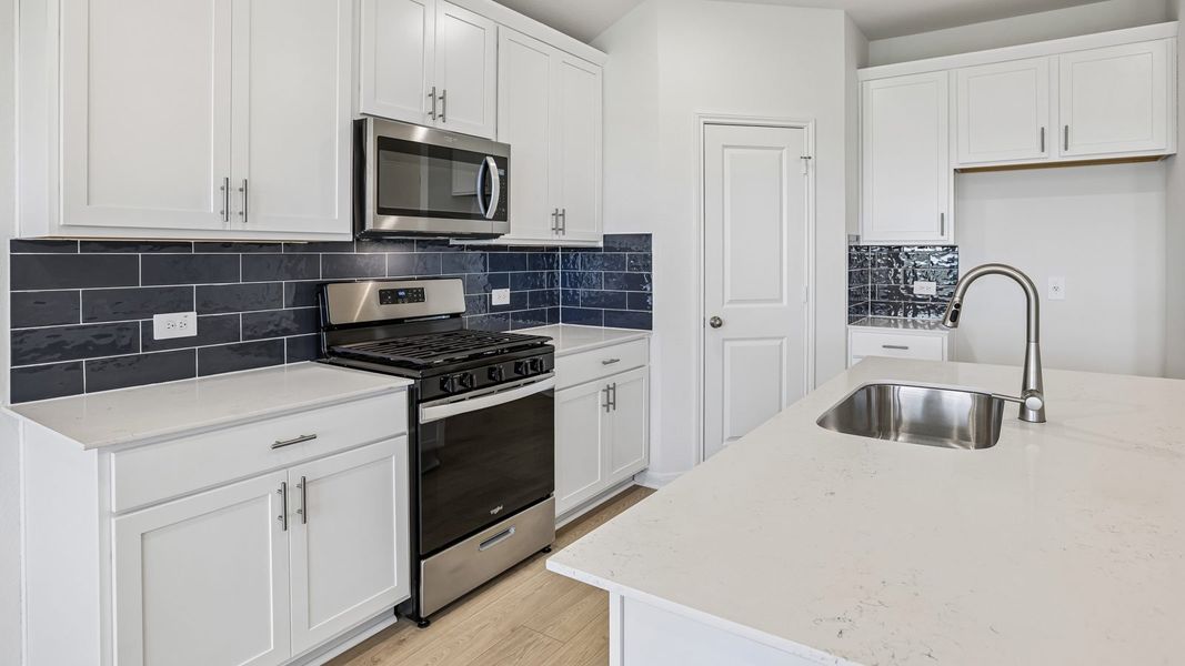 Furnished interior view inside a new home in Briarwood, Elgin (Image 8).