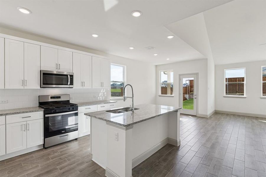 Furnished interior view inside a new home in Venetian, Weston (Image 5).