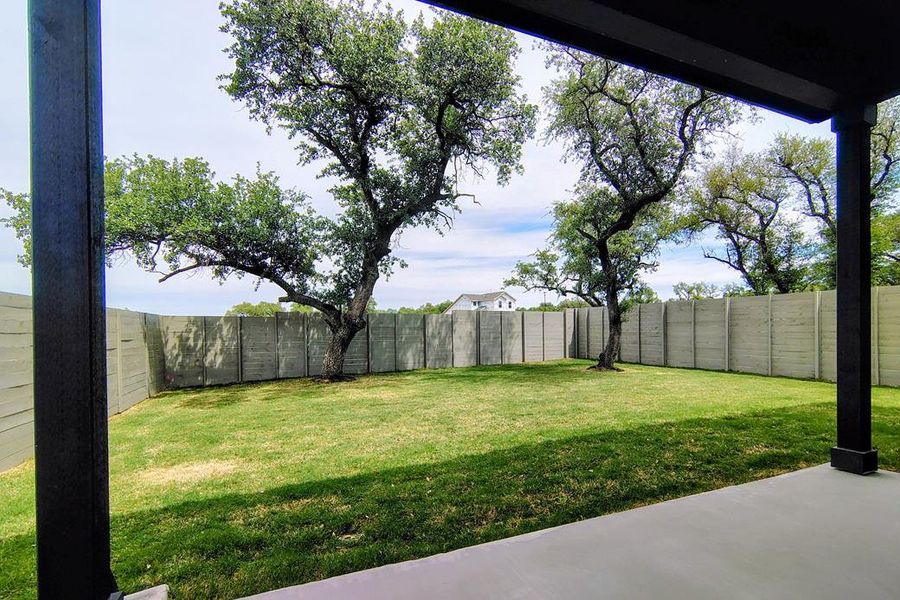 Exterior details and patio area of a home in Wolf Ranch, Georgetown (Image 23).