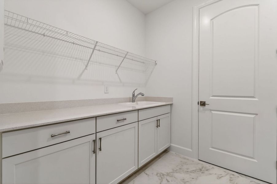 Furnished interior view inside a new home in Del Webb Tradition, Port St. Lucie (Image 48).