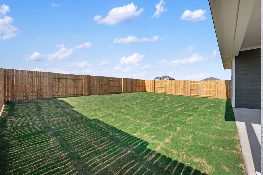 Exterior details and patio area of a home in Patterson Ranch, Georgetown (Image 28).