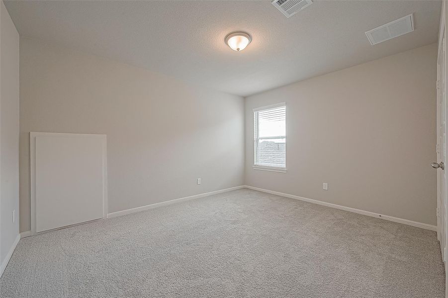 Spacious, unfurnished interior of a new home in Mill Creek Trails, Magnolia (Image 19).
