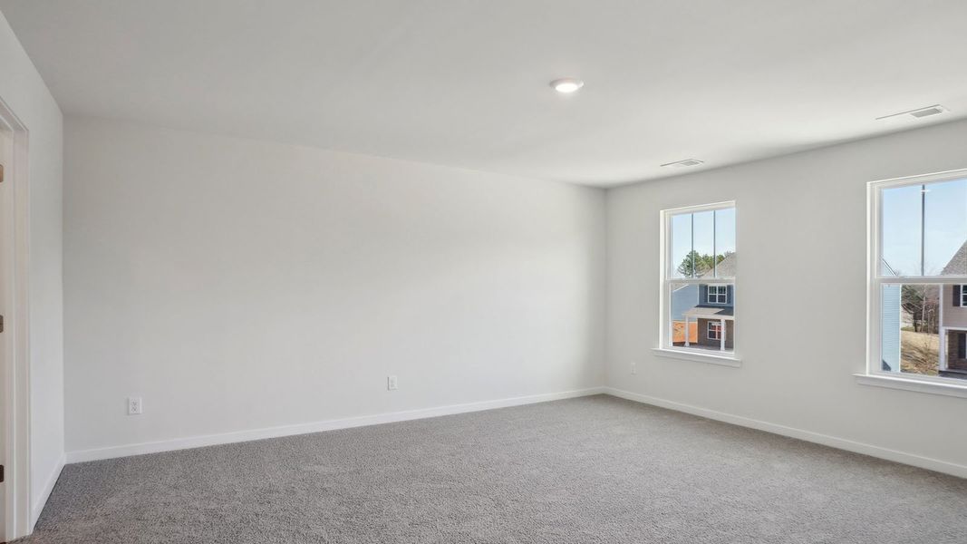 Spacious, unfurnished interior of a new home in Tap Root Farms, Fletcher (Image 14).