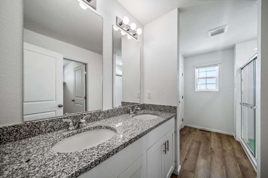 Furnished interior view inside a new home in Reunion, Commerce City (Image 9).