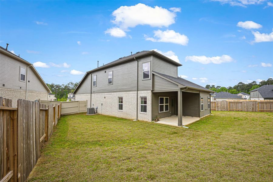 Exterior details and patio area of a home in Audubon, Magnolia (Image 3).