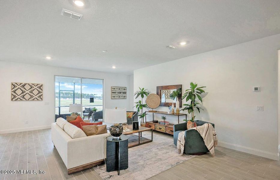 Furnished interior view inside a new home in Edenbrooke at Hyland Trail | 55+: Edenbrooke at Hyland Trail 60s, Green Cove Springs (Image 13).