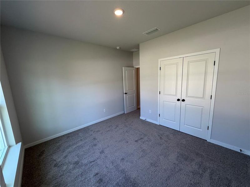 Spacious, unfurnished interior of a new home in Reserve East, Flagler Beach (Image 28).