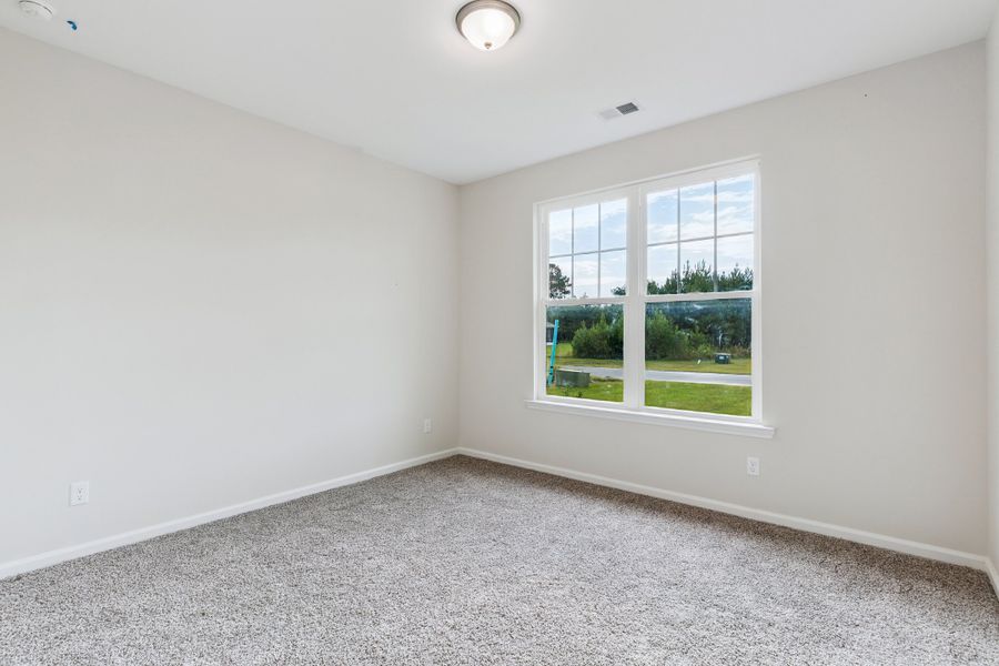 Representative unfurnished interior of a home built from the The Athens + Bonus Room by Smith Family Homes in NorthShore on the St. Marys River, Kingsland (Image 18).