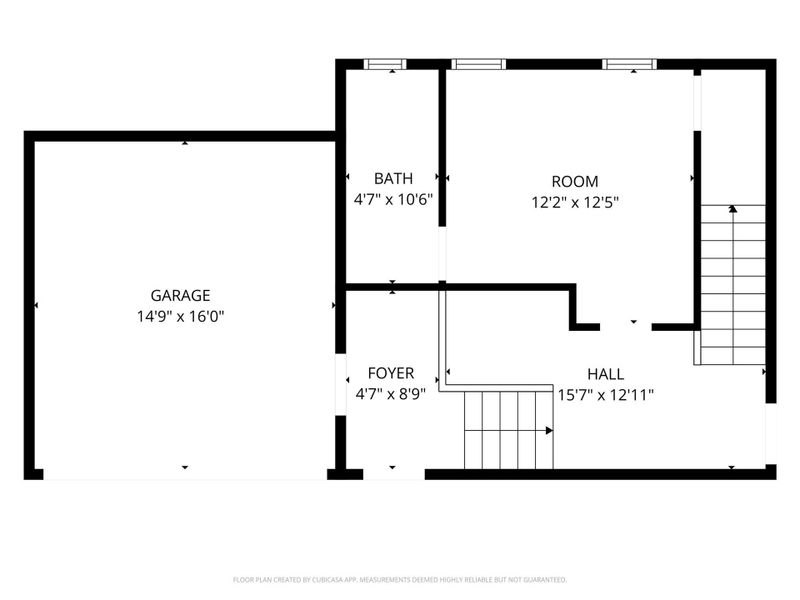 First-floor plan featuring the garage, foyer, full bathroom, and additional room.