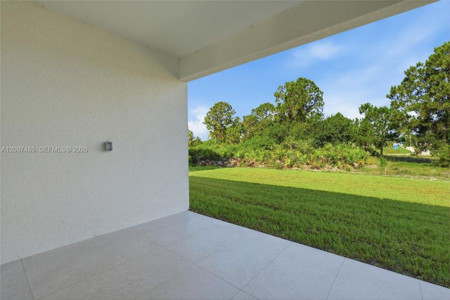 Exterior details and patio area of a home in , Lehigh Acres (Image 4). Exterior details and patio area of a home in , Lehigh Acres (Image 4).