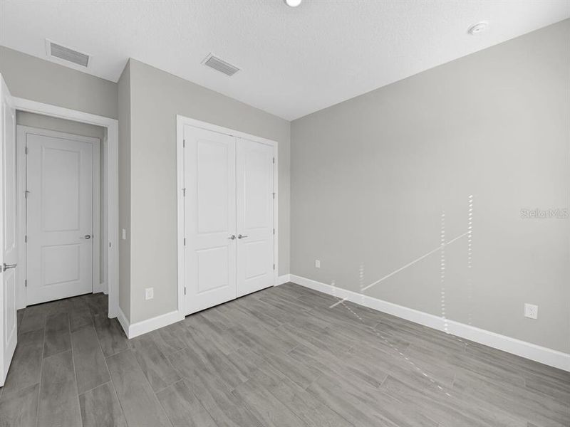 Spacious, unfurnished interior of a new home in Esplanade at Westview, Kissimmee (Image 20). Spacious, unfurnished interior of a new home in Esplanade at Westview, Kissimmee (Image 20).