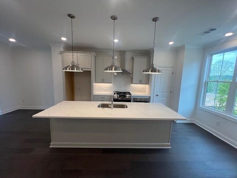 Furnished interior view inside a new home in Palisades Townhomes, Cumming (Image 6). Furnished interior view inside a new home in Palisades Townhomes, Cumming (Image 6).