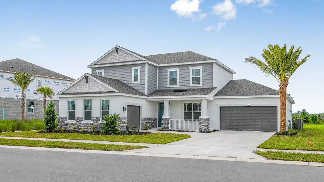 Representative exterior photo of a completed home built from the Anna Marie by Taylor Morrison in Hammock at Two Rivers, Zephyrhills, FL (Image 20).