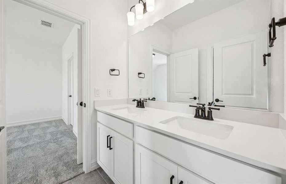 Upgraded secondary bath with double sinks Upgraded secondary bath with double sinks